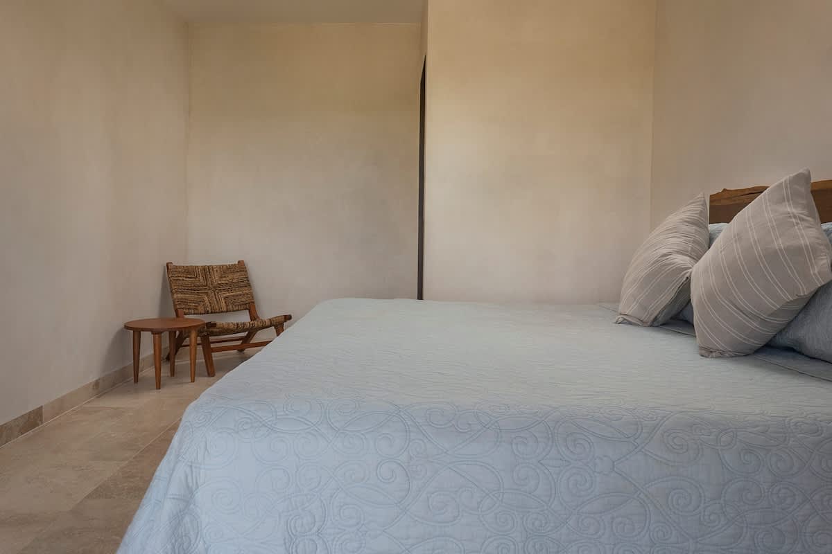 Bedroom #5 features two comfortable king-size beds and beautiful jungle views, creating the perfect relaxing retreat.
