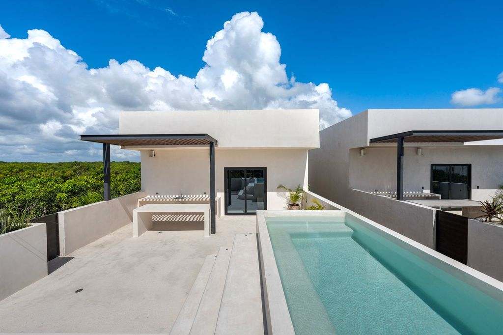 Lovely rooftop terrace, perfect for soaking up the sun and enjoying the large, refreshing pool.
