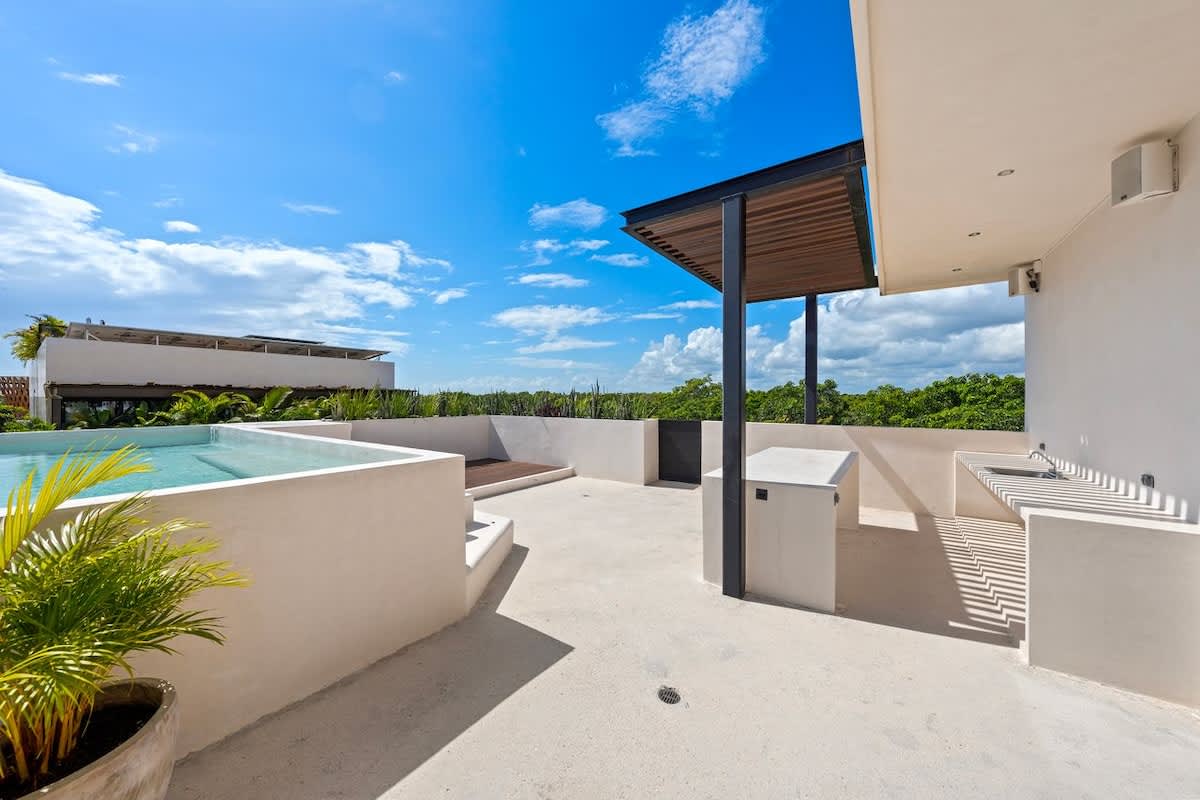 Lovely rooftop terrace, perfect for soaking up the sun and enjoying the large, refreshing pool.