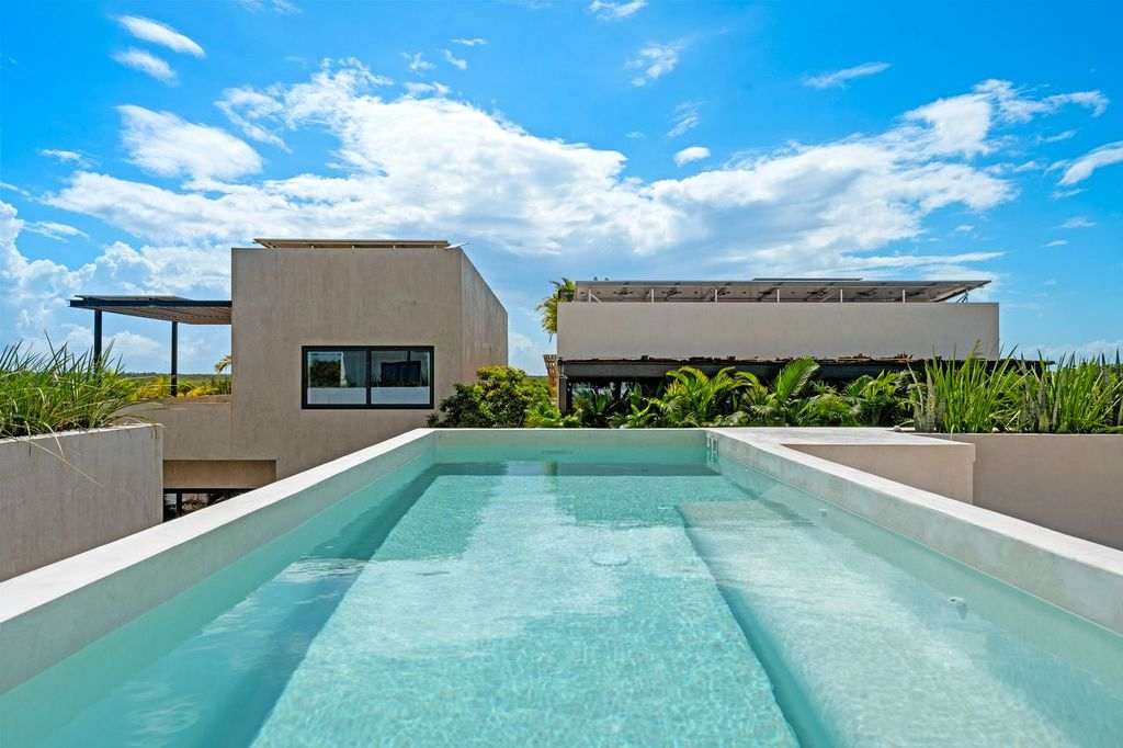 
Lovely rooftop terrace, perfect for soaking up the sun and enjoying the large, refreshing pool.