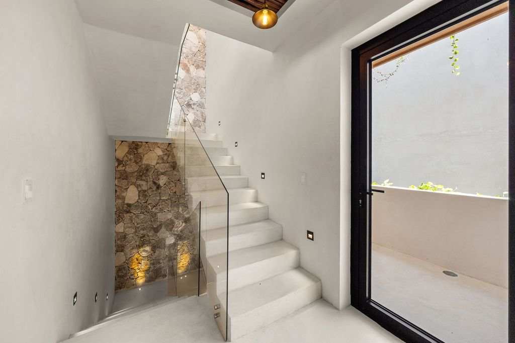 Staircase leading to the 3rd floor.