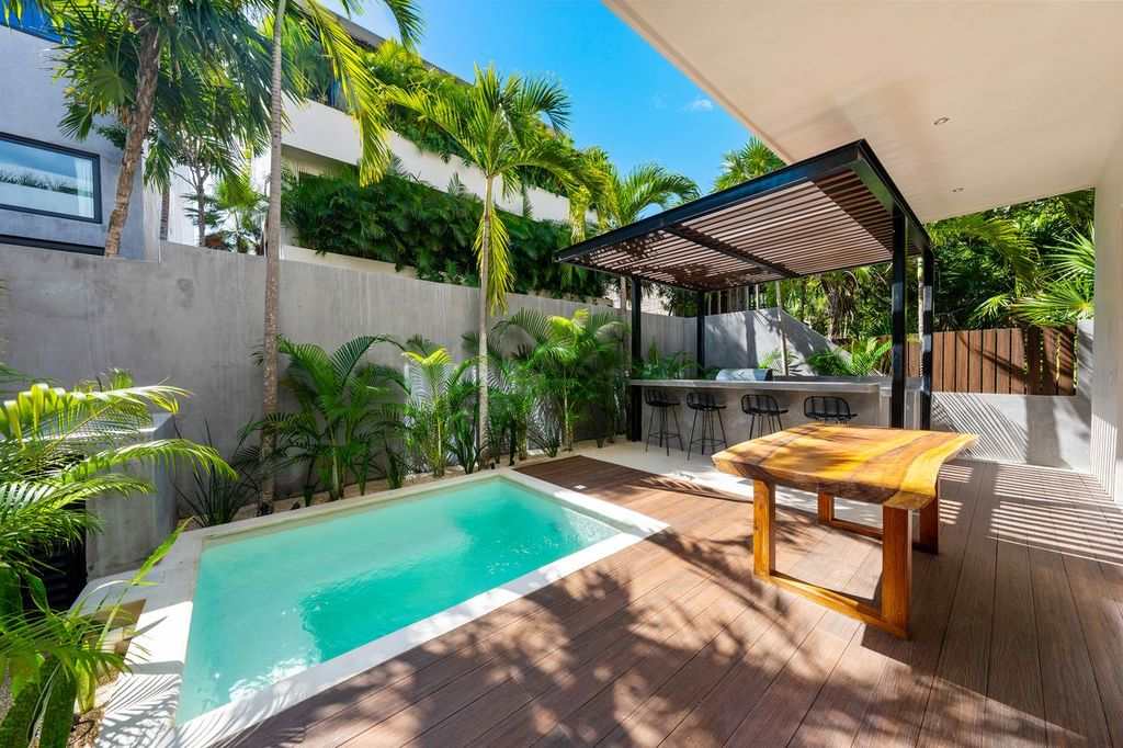 Enjoy the first pool area on the ground floor, complete with a BBQ space for memorable meals outdoors.