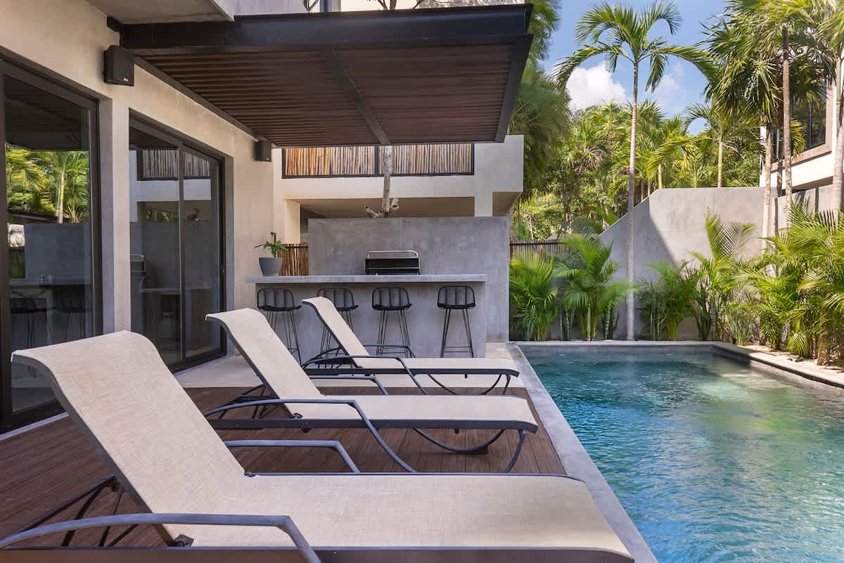 Pool #1 -- Enjoy the first pool area on the ground floor, complete with a BBQ space for memorable meals outdoors