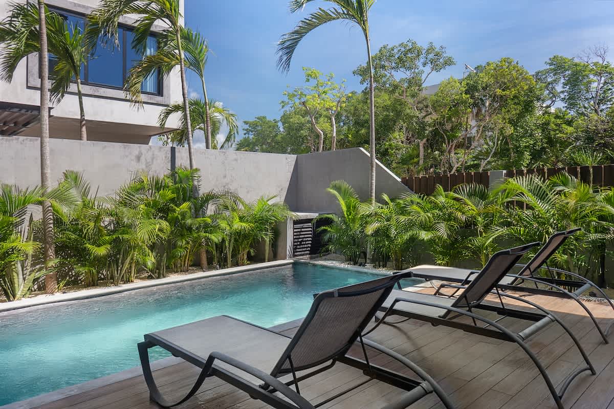 Pool #1 -- Enjoy the first pool area on the ground floor, complete with a BBQ space for memorable meals outdoors