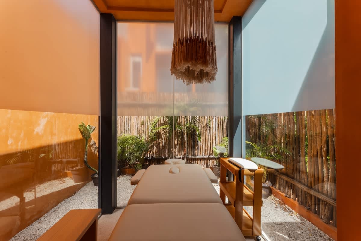 Spa Room: Enjoy access to our tranquil spa room, featuring a professional massage table. This space is available by reservation and subject to availability. Please note that massage services and a therapist are not included.