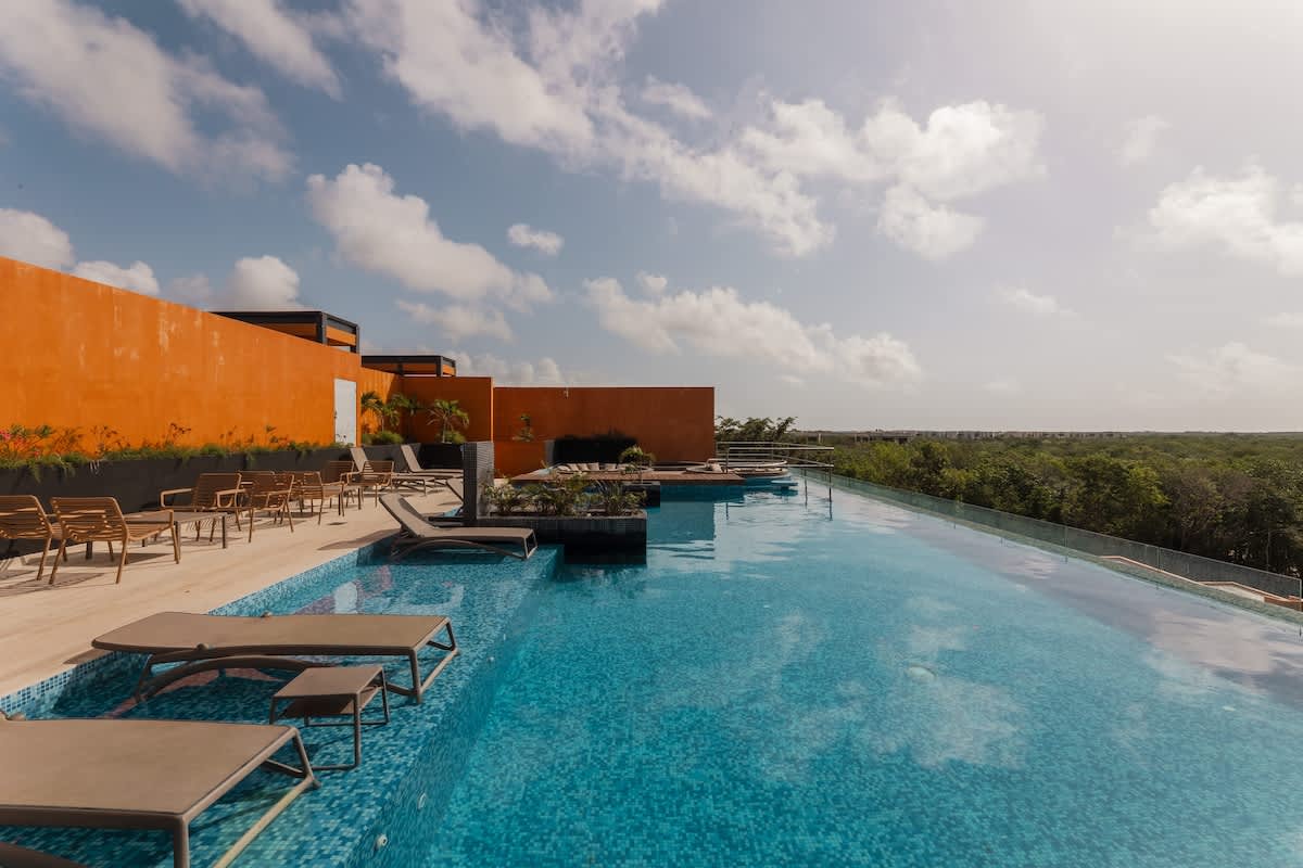 🌿 Shared Rooftop: Enjoy breathtaking jungle views from our shared rooftop—the perfect spot to relax, watch the sunset, or soak in the peaceful surroundings.