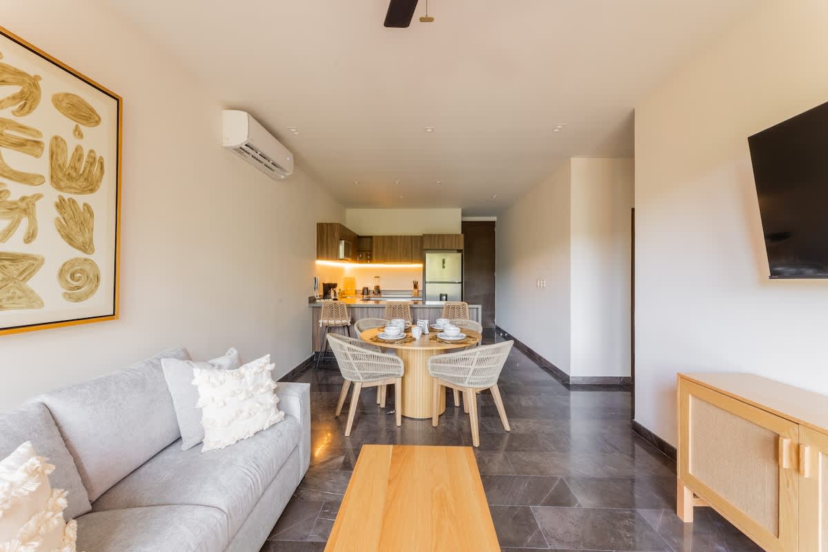 Living Area--Relax in a cozy, bright living space featuring a comfortable sofa bed.