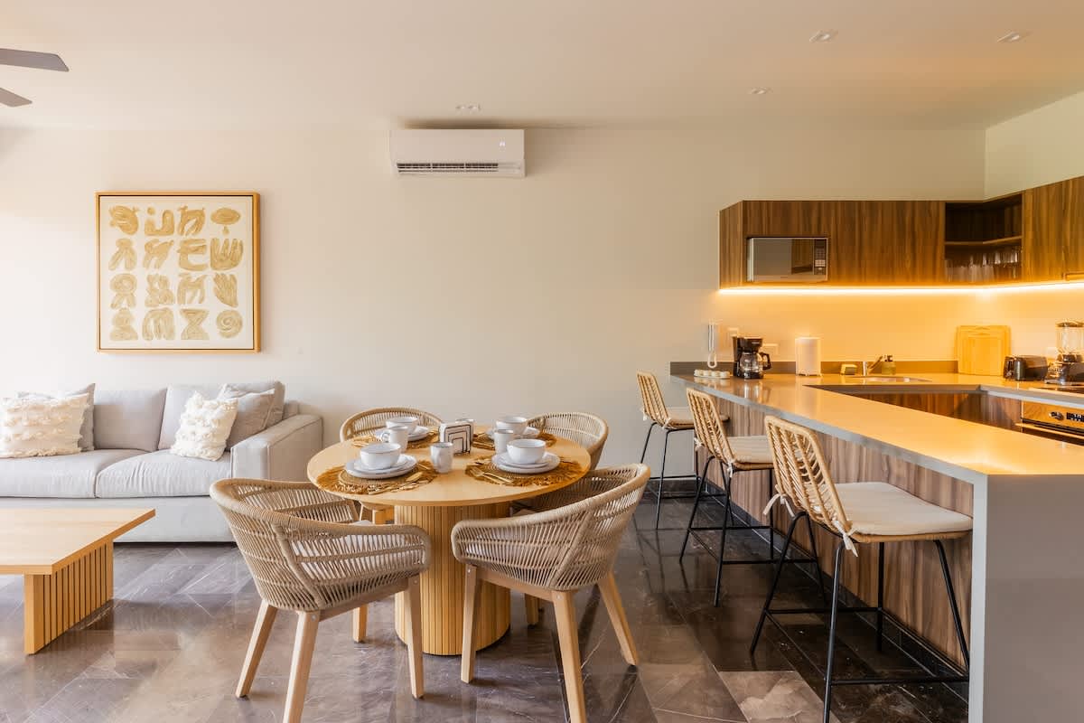 Living Area--Relax in a cozy, bright living space featuring a comfortable sofa bed.