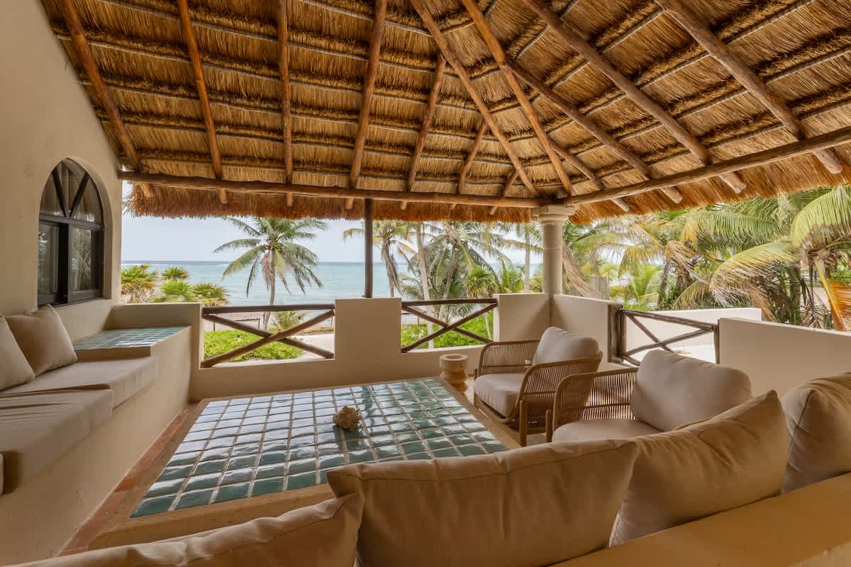 Private terrace with stunning ocean views, ideal for gathering with family and friends.