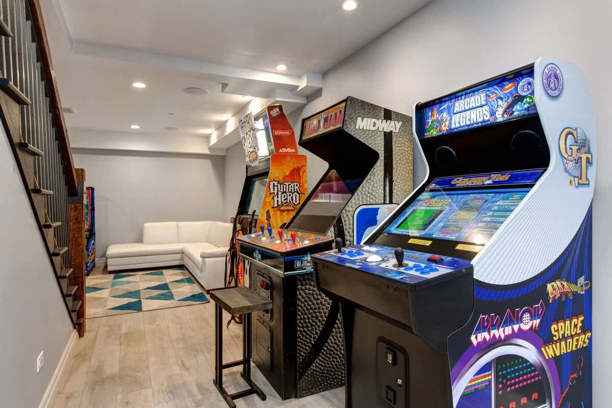 Media Room | Lower Level, TV, Shuffleboard, Arcade Legends, Guitar Hero, Whac-a-Mole & More! | Abode at First Chair