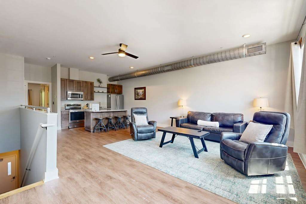 Spacious, chic retreat with balcony & AC - walk to dining, shops, & entertainment
