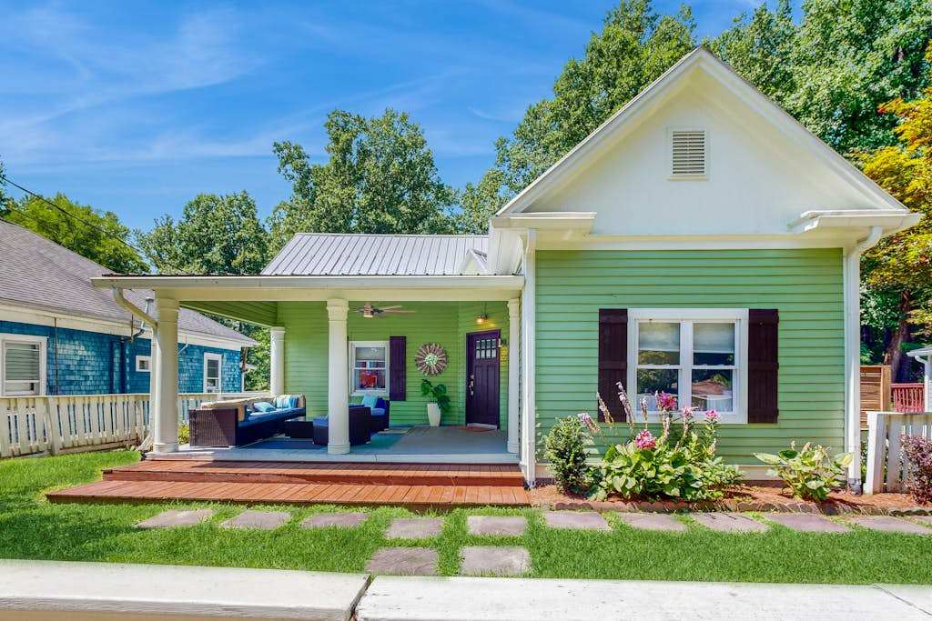 Dog-friendly downtown retreat with 2 kitchens & large fenced yards