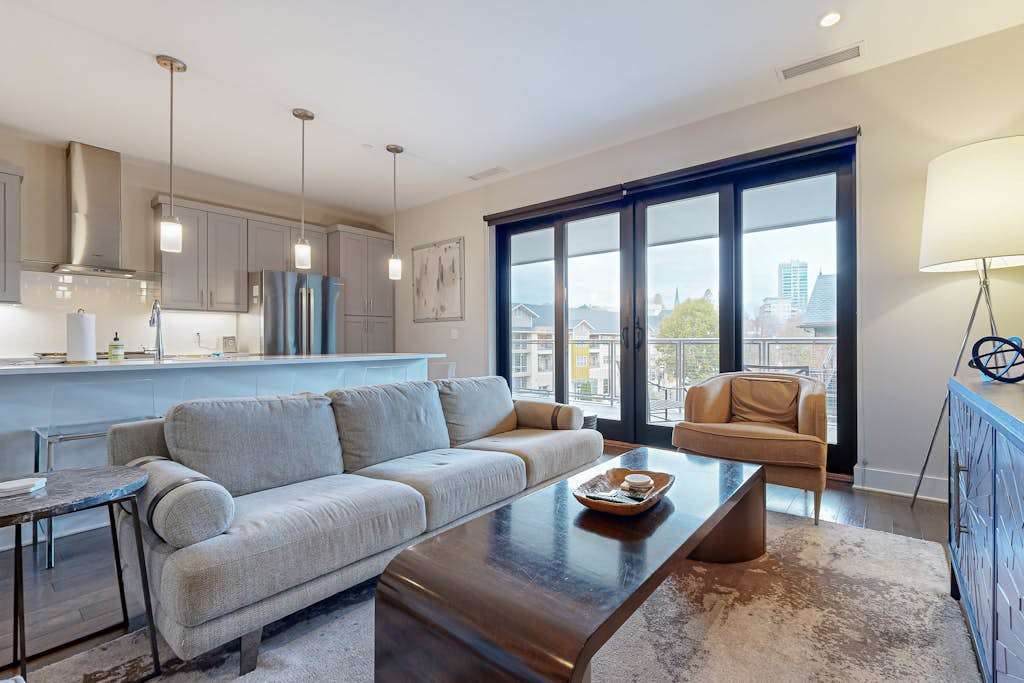 Modern art-deco condo with balcony, central AC, & W&D - dogs OK