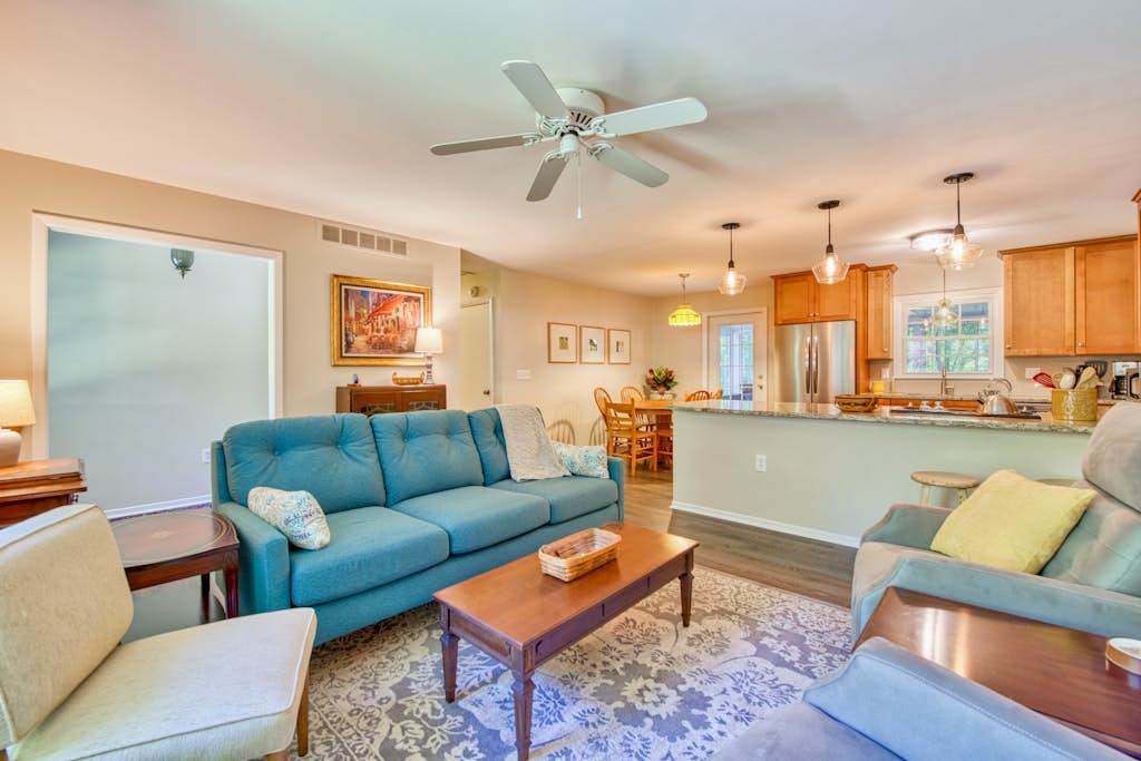 Dog-friendly home with large yard, lawn games, firepit, screened porch, & AC