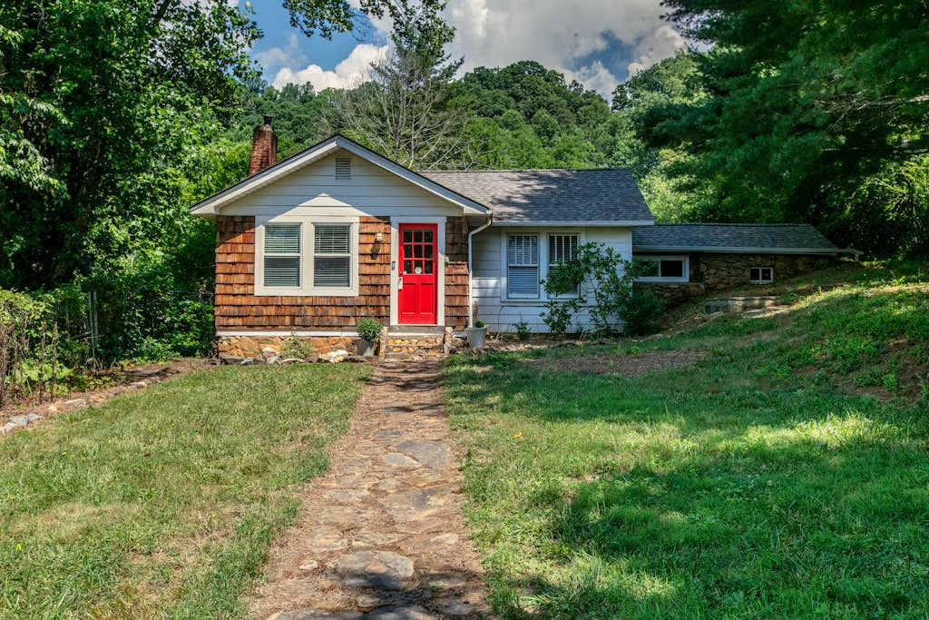 Well-appointed home with a gas grill and fire table