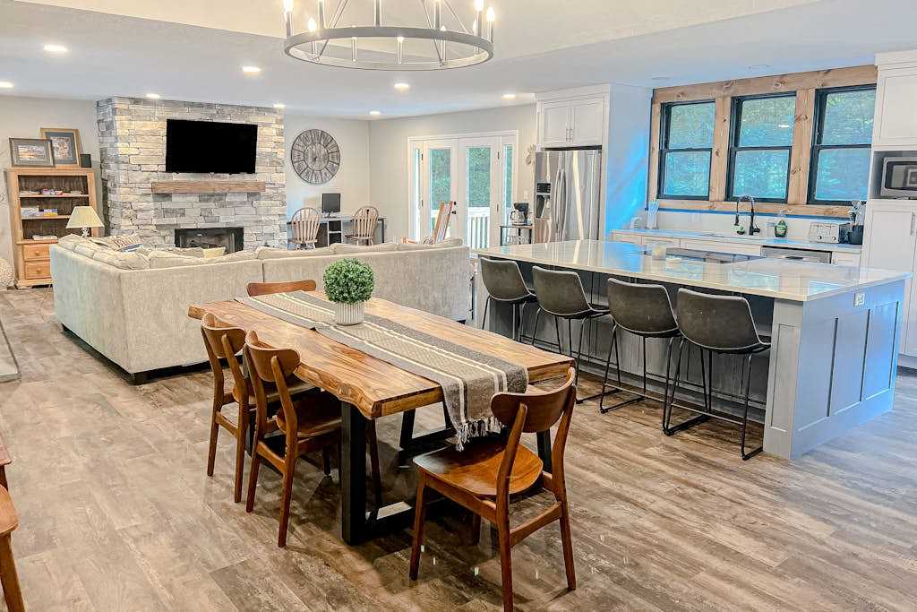 Escape near the lake with game room, firepit, deck, Hot Tub & open-concept