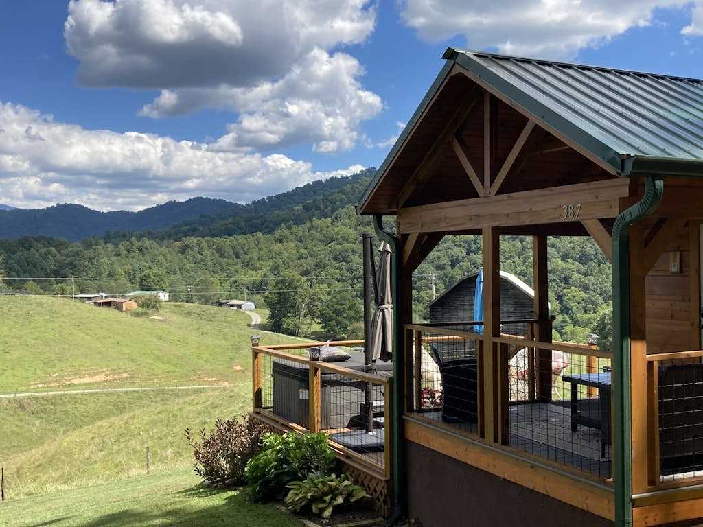 2 Tiny home cabins with private hot tubs, covered porches, & amazing views