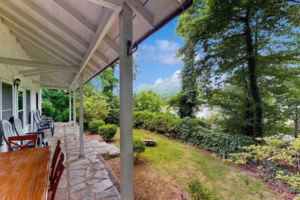 Lakefront cabin at Lake Lure with grill, boathouse, dock & porch