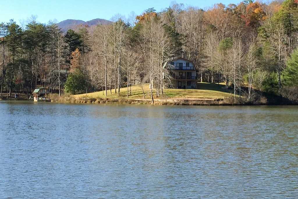 Dog-friendly lake front home with private dock and mountain views