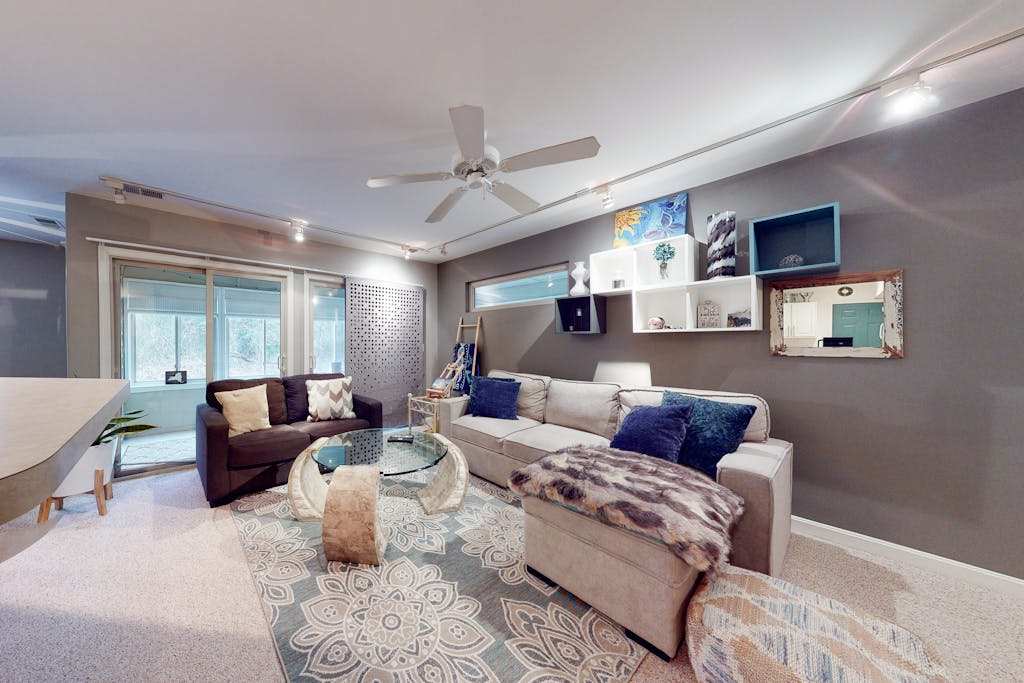 The Plantations condo near beach with a sunroom