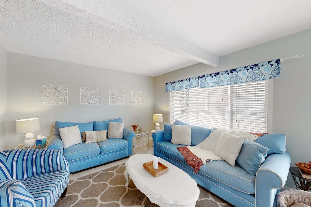 Enchanting dog friendly condo with ocean views from the balcony featuring a pool & a washer & dryer