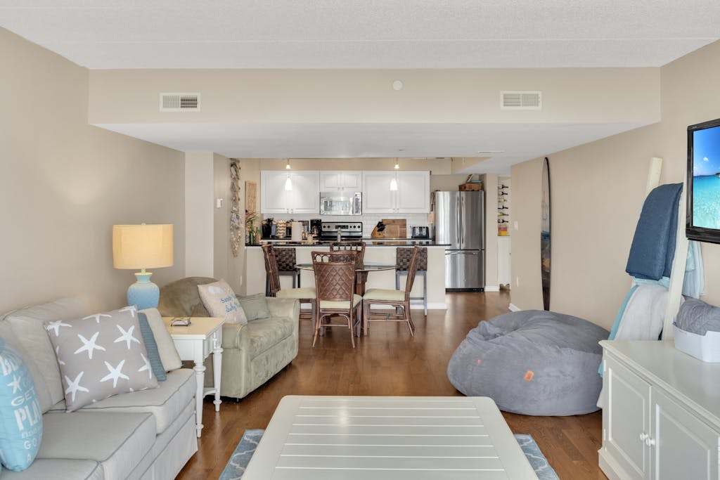 Condo with marina views in the Town of Dewey Beach featuring a pool & balcony