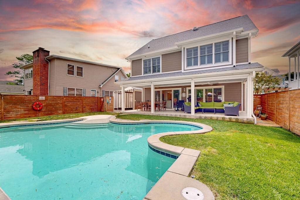 Dog friendly home with heated outdoor pool & games only 3 blocks from the beach