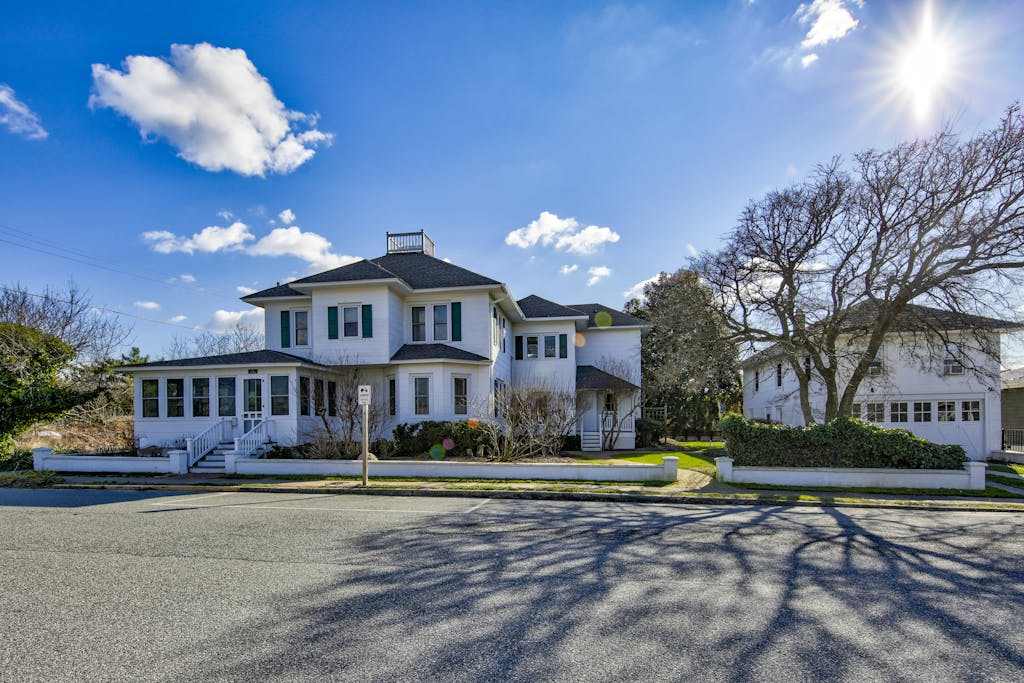Classic 1920s oceanfront home & cottage with AC bikes grill walk to beach