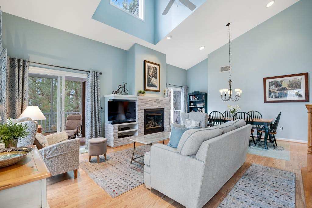 Two story beach gem with wraparound screened porch pool sauna & gym