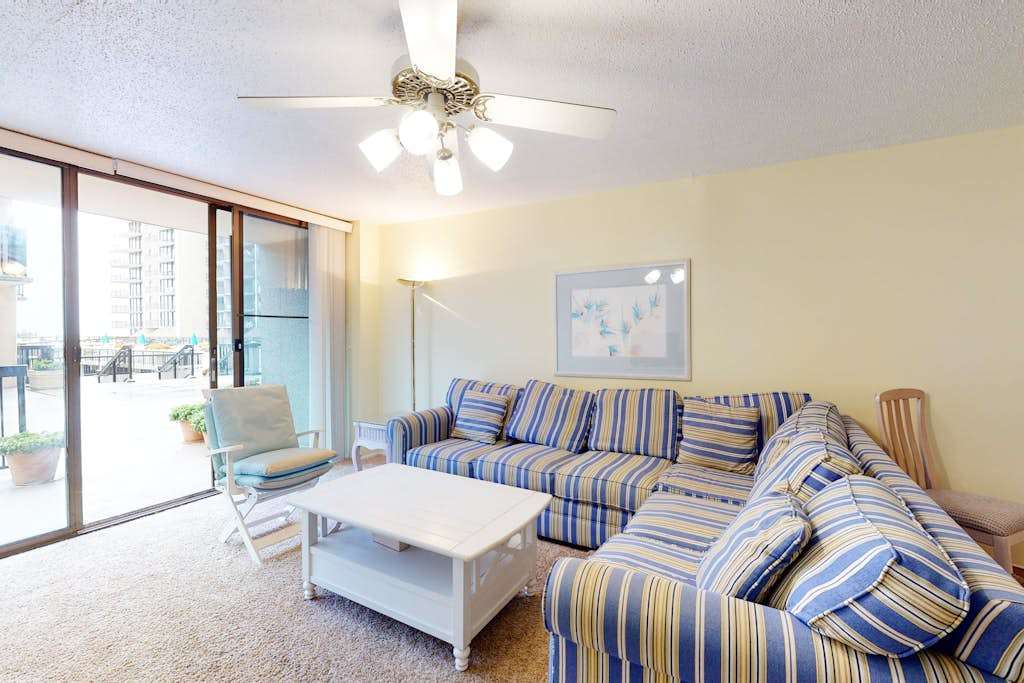 1st floor Sea Colony condo with shared gym tennis court & elevator