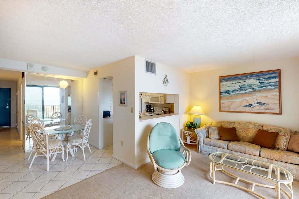 Sea Colony 2nd floor condo with free WiFi shared tennis court & sauna with an ocean view
