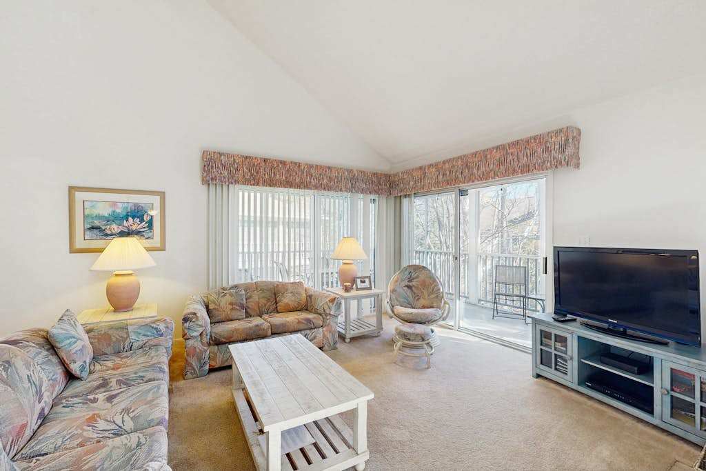 Sea Colony Tennis condo with tennis court pool washer & dryer & covered porch