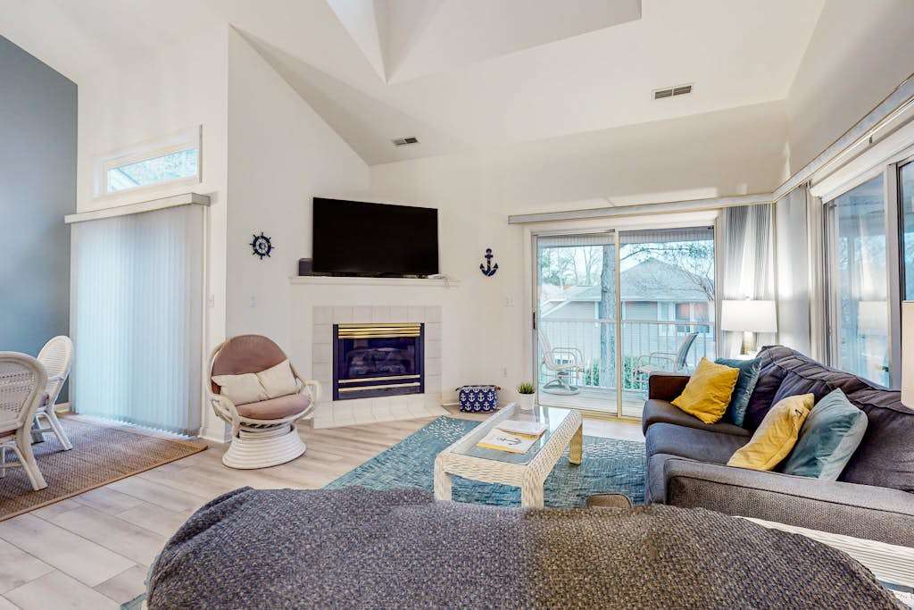 Sea Colony tennis 2nd floor condo with gym basketball court & pool