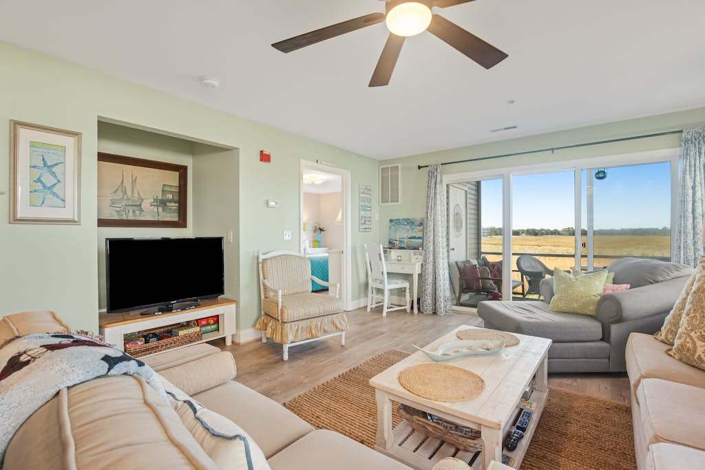 Bethany Bay condo with pool fireplace screened porch & AC