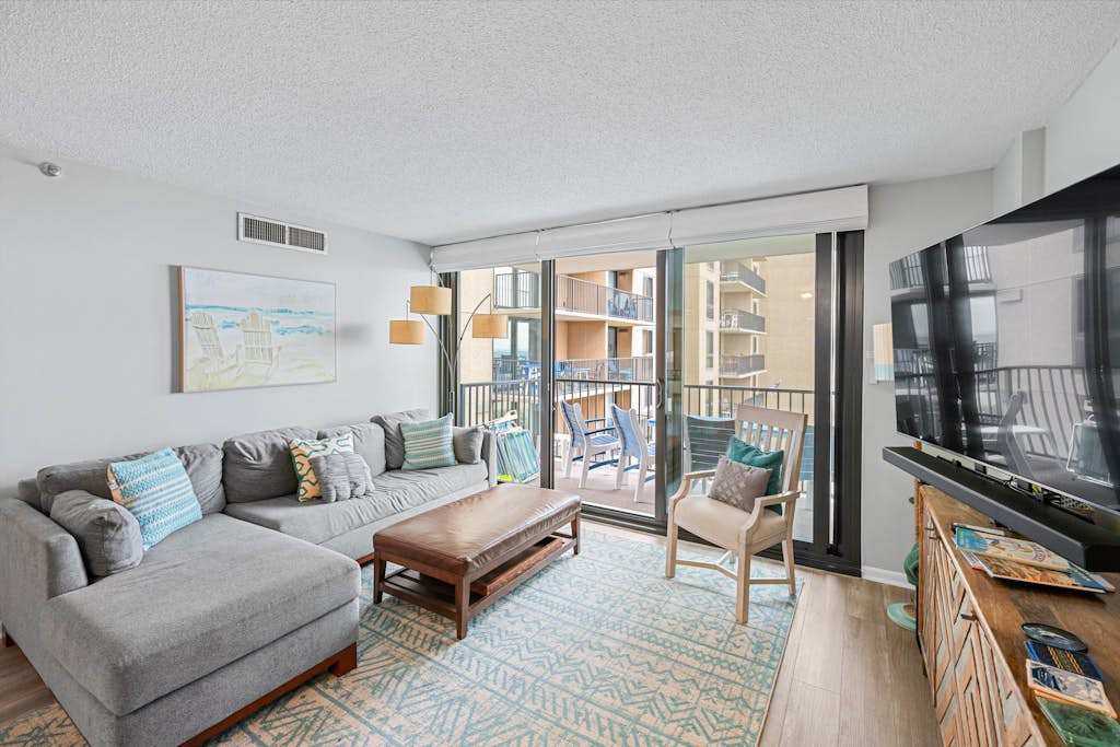Sea Colony Ocean condo with shared pools hot tubs beach access & balcony