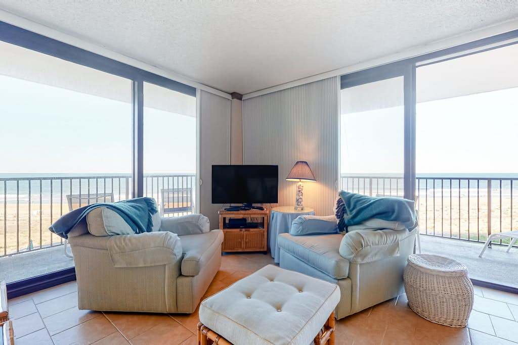 Sea Colony corner condo with ocean views wraparound balcony pools & beach