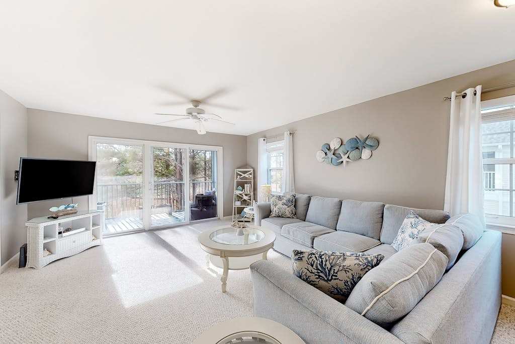 2nd floor condo at Bethany Bay with pool on site golf & sports courts