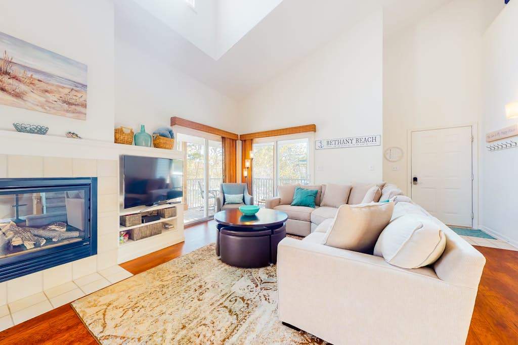 Sea Colony condo with multiple pools sports courts & beach access
