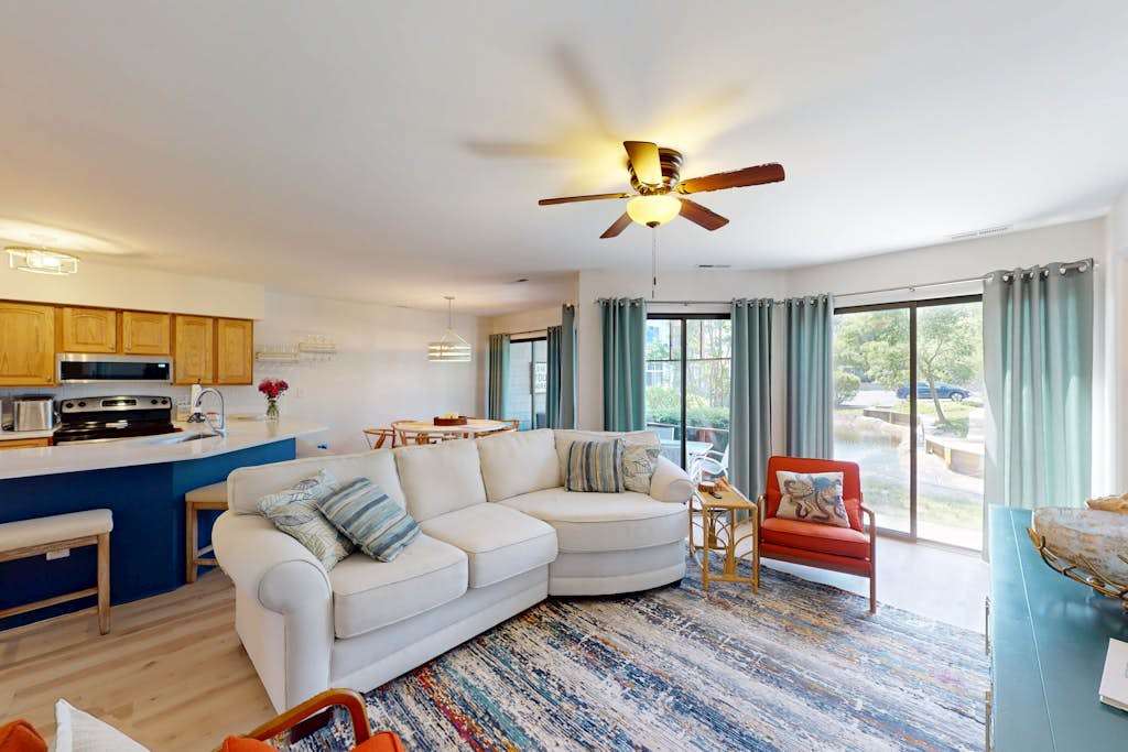 East of Sun condo with water view patio on site pool & tennis near beach