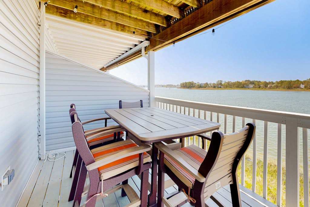 Bethany Marina bayfront condo with pool fireplace water views