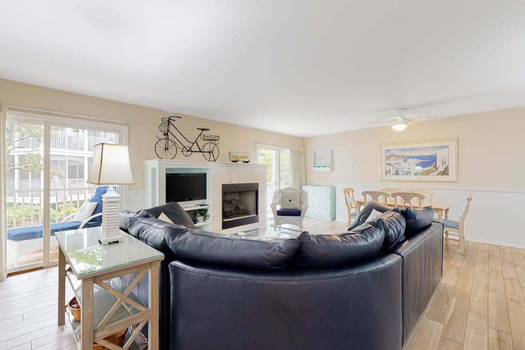 Sea Colony condo with access to pools tennis courts gym & a private beach