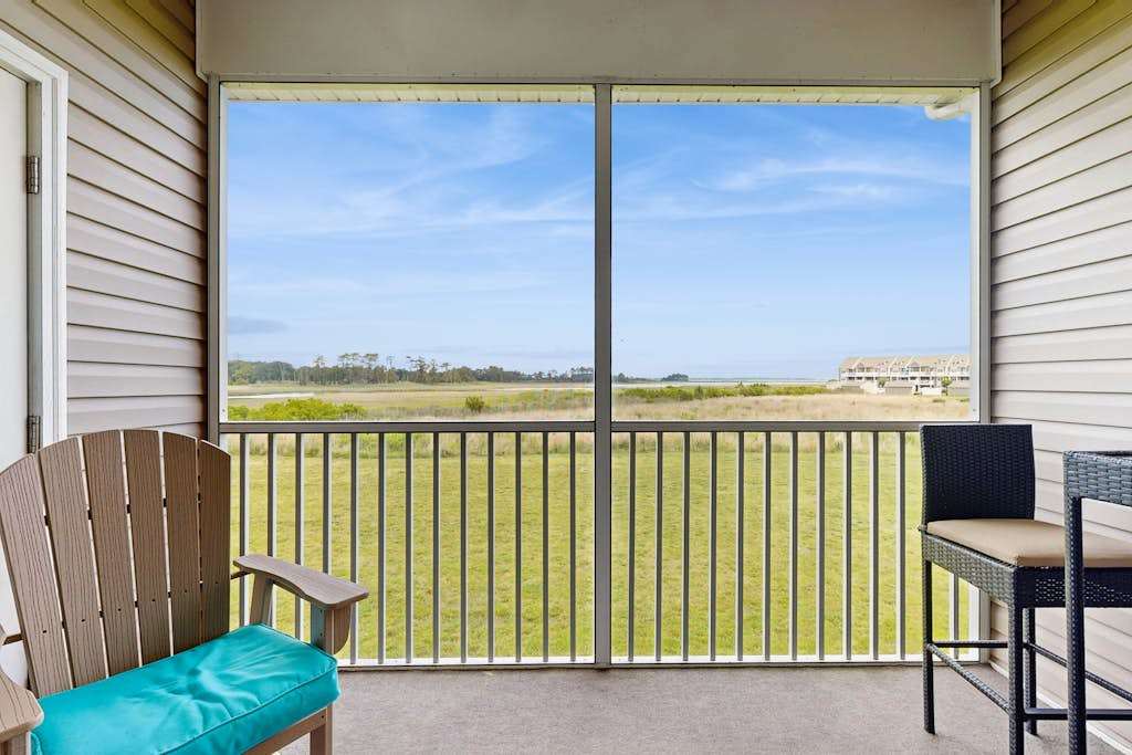 Bethany Bay condo with bay views athletic courts pool fireplace & balcony