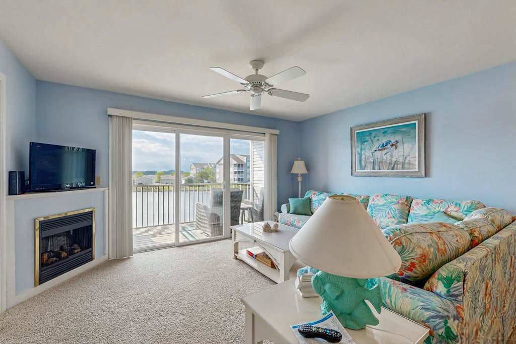 2nd floor Bethany Bay condo with waterfront views & on site golf pool & tennis