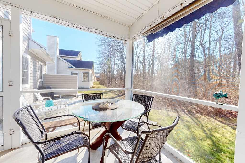 Updated Waterside home near beach with screened deck & community pool