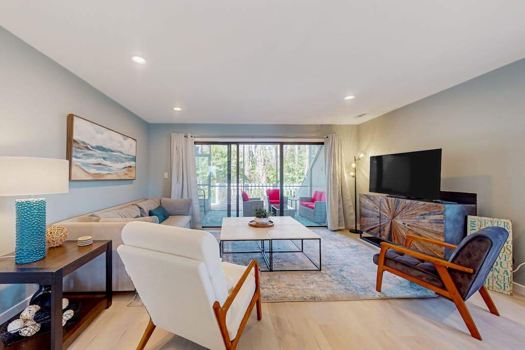 Sea Colony condo with 12 pools private beach tennis shuttle gym & deck
