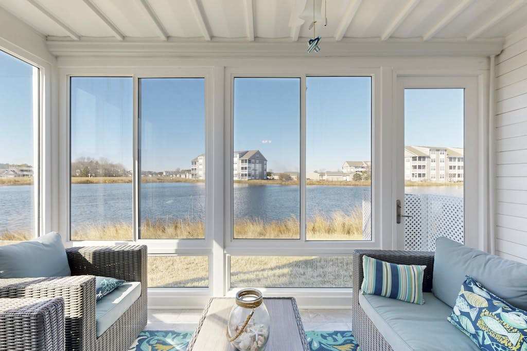 1st floor Bethany Bay condo with bay views & on site golf & pool & tennis