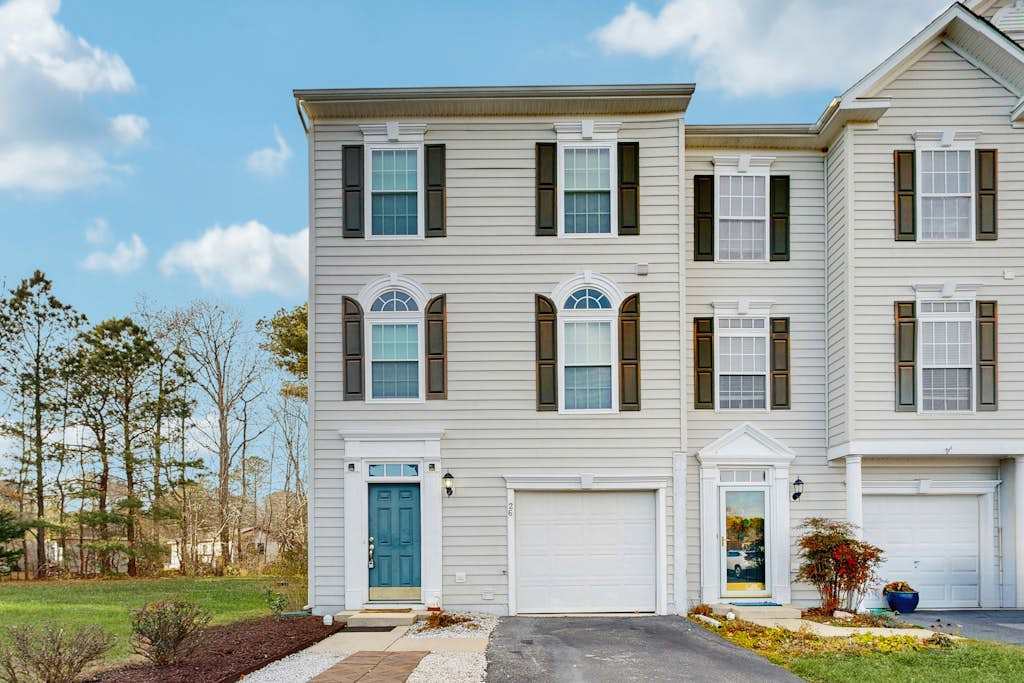 Townhomes of Providence dog friendly townhouse with shared pool deck washer & dryer