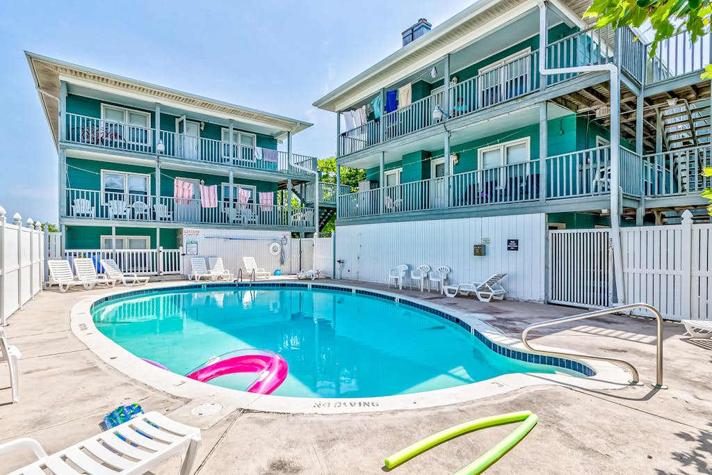 Peek-a-Boo Oceanview Condo with Shared Pool & Prime Location 1 Block from Beach