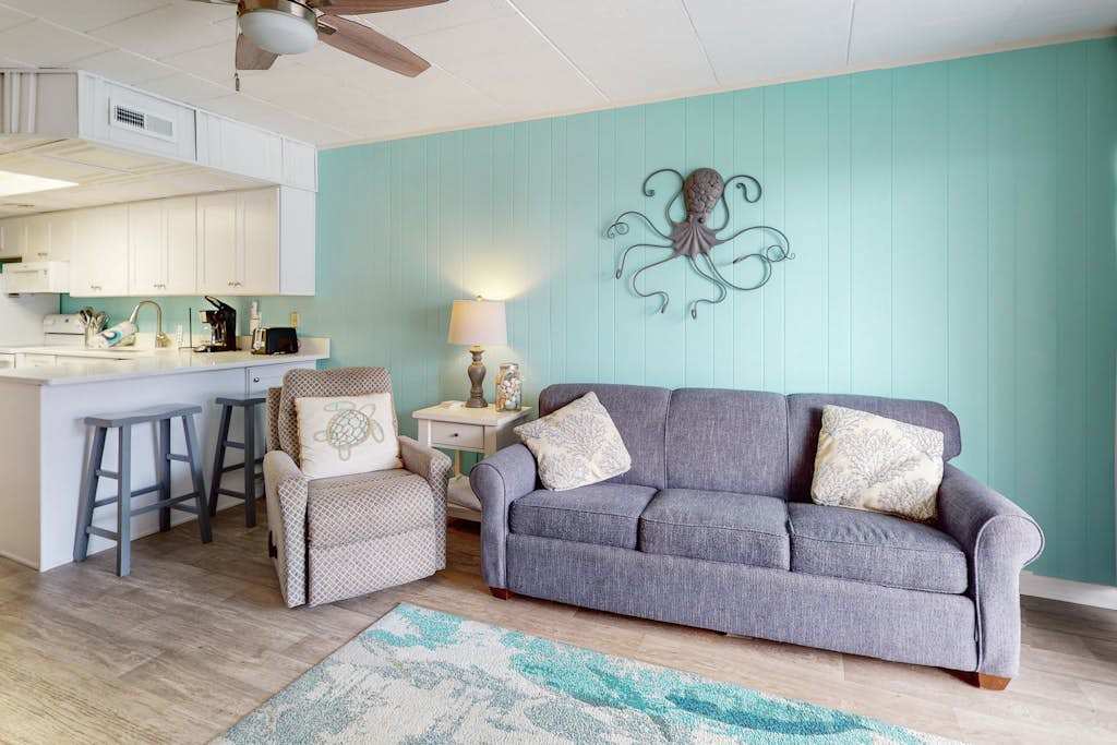 Ocean-view condo with balcony & pool access - steps from the beach