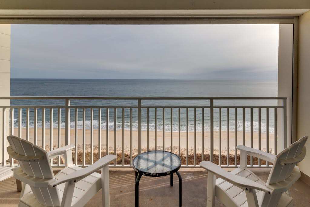Tranquil waterfront condo with pools, gym, arcade & ice rink